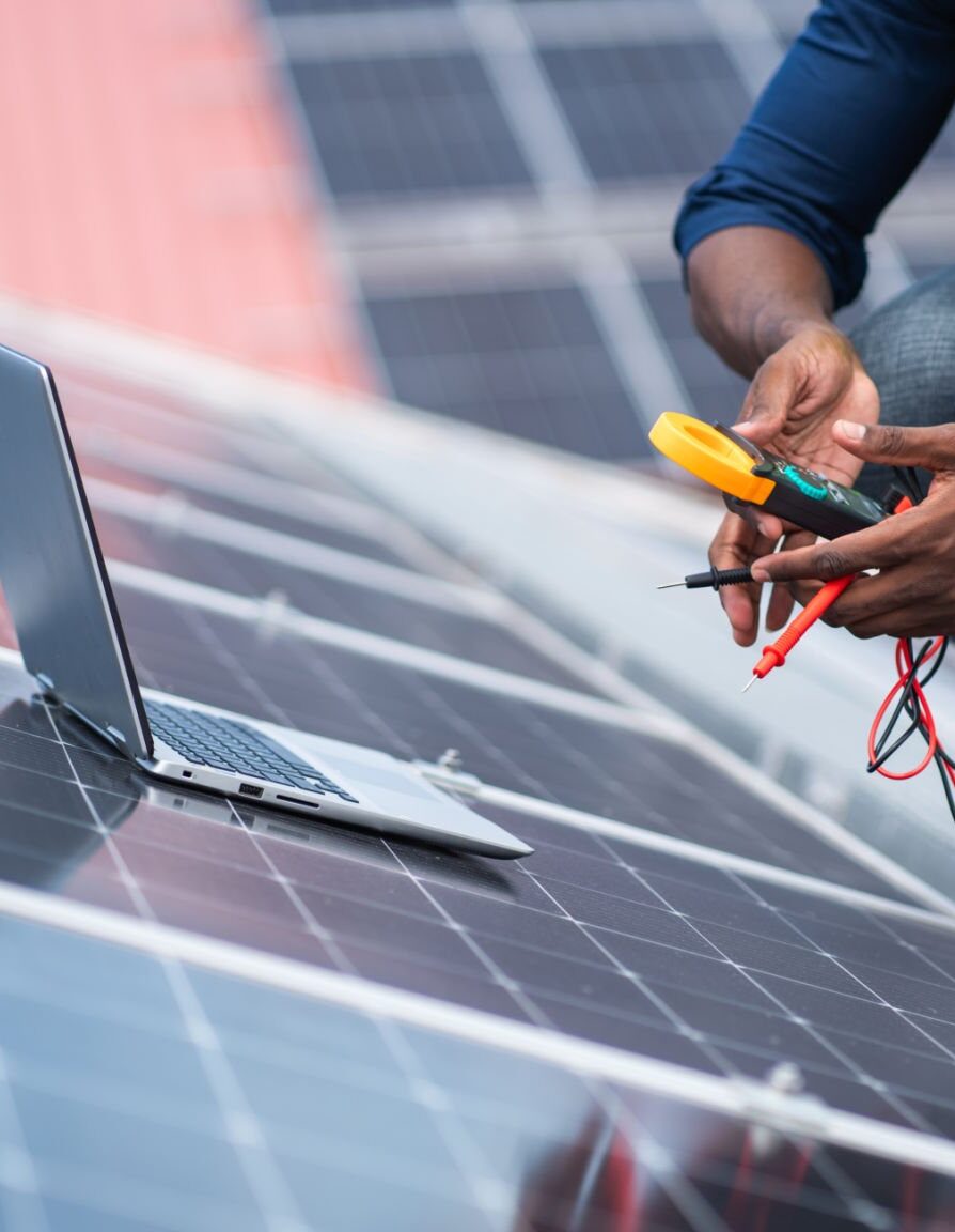 Service engineer checking solar cell on the roof for maintenance if there is a damaged part. Engineer worker install solar panel. Clean energy concept.